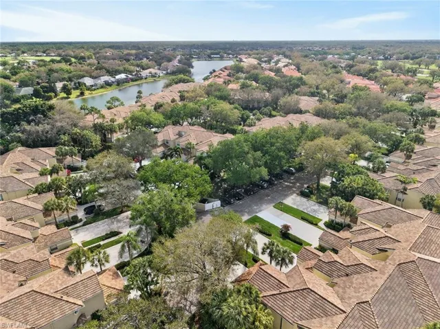 Aerial view of residential area with a large body of water