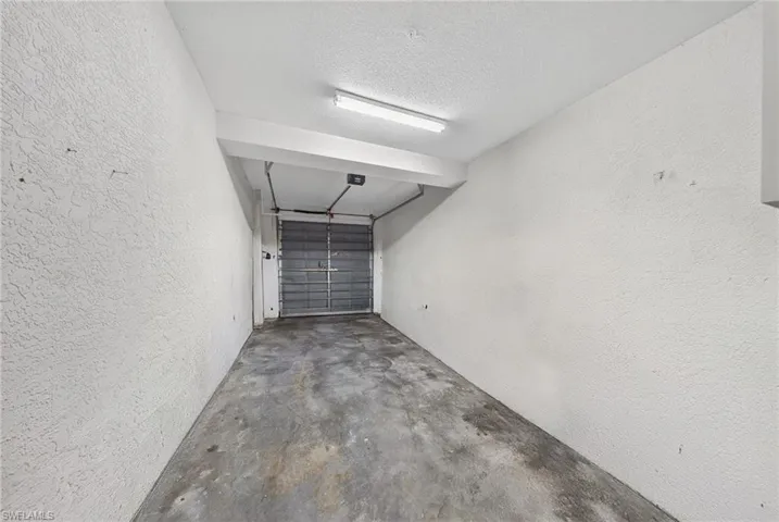 Garage featuring a textured wall