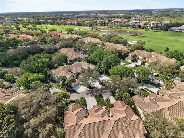 Aerial view of a large body of water and a local golf course
