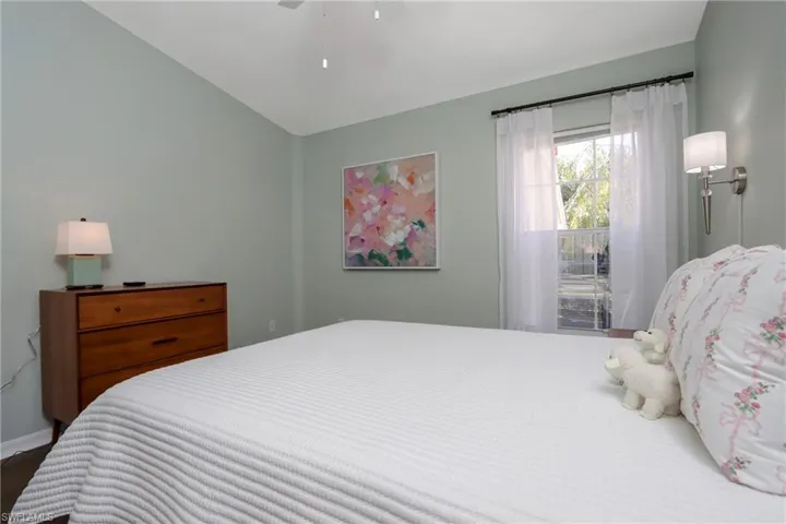 Bedroom featuring baseboards and ceiling fan