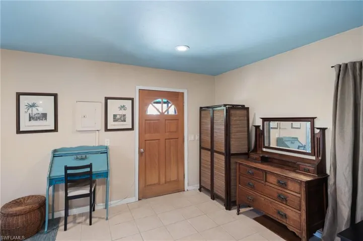 Bathroom with a stall shower and vanity