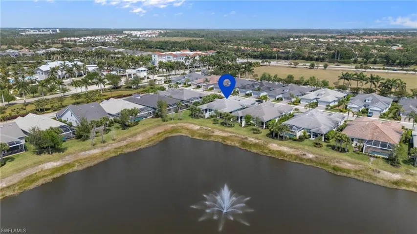 Aerial view featuring a residential view and a water view