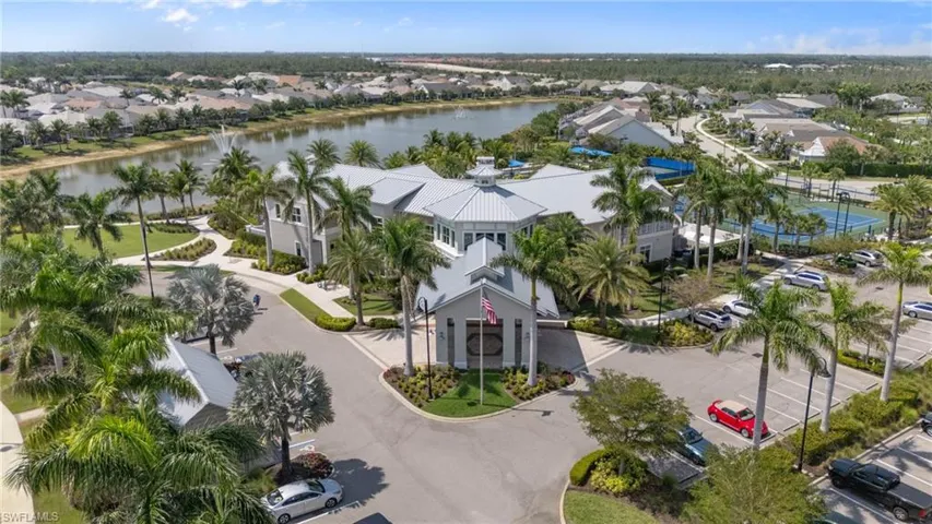 Aerial view with a water view and a residential view