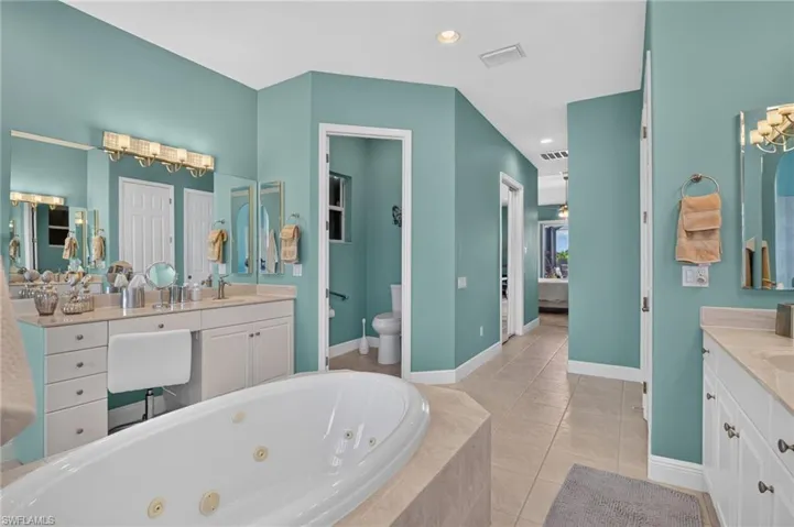 Master bath with private toilet room