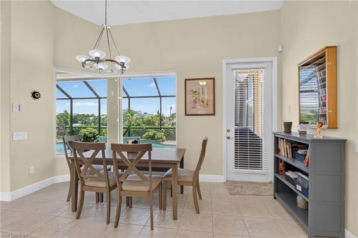 Breakfast Nook with view of pool and canal