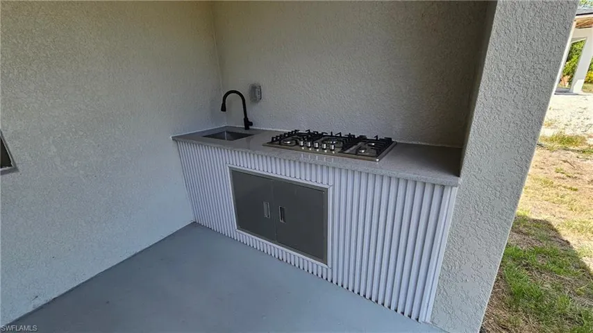 View of patio / terrace with a sink
