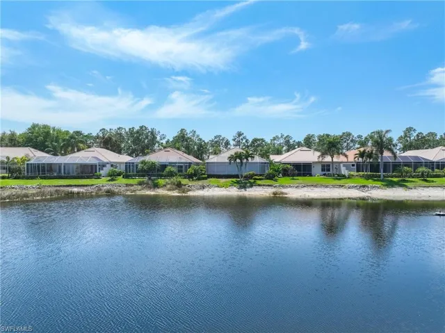 Water view featuring nearby suburban area