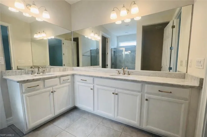Master Bathroom with dual sinks and plenty of counter space