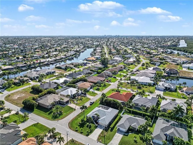 Aerial overview of property's location with all residential homes in areaand a near gulf access homes and spreader canal