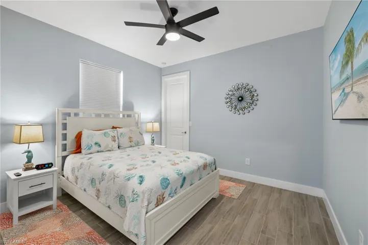 Bedroom featuring ceiling fan /light and walk in closet
