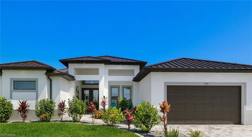 Moden home featuring added lanscaping