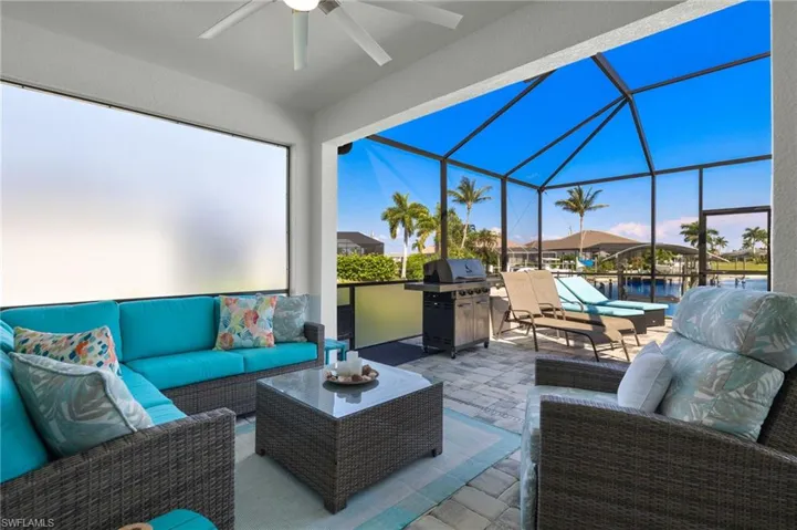 Oversize lanai with vaulted ceiling and dock views