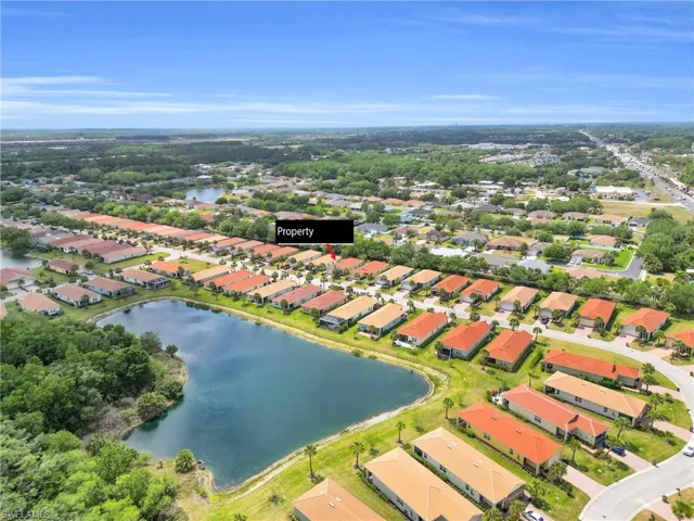 Aerial view with a residential view and a water view
