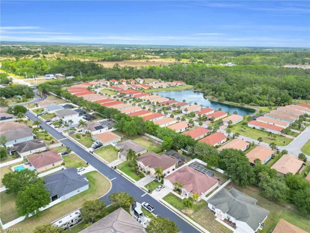Bird's eye view with a water view and a residential view