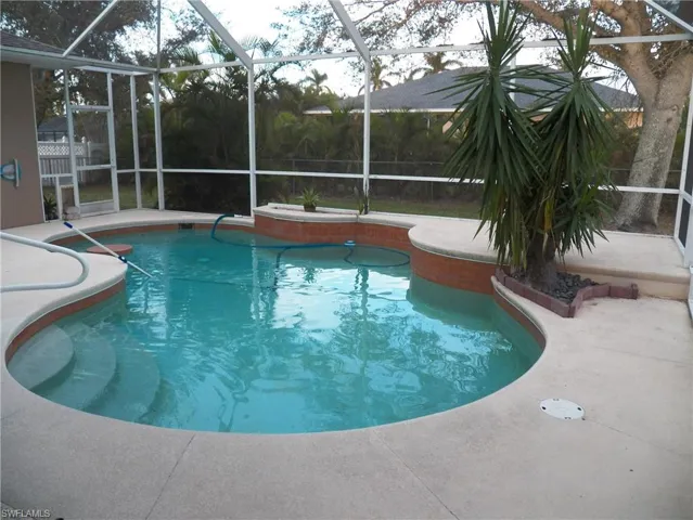 View of swimming pool with steps