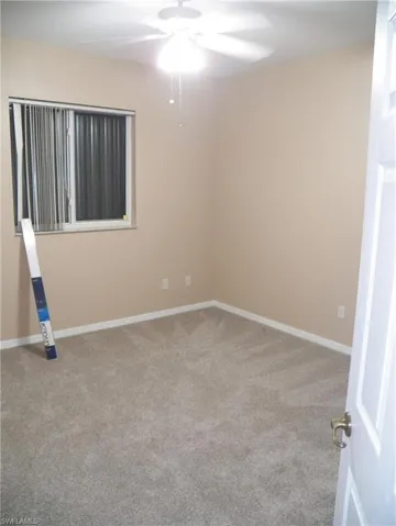 Carpeted second guest room