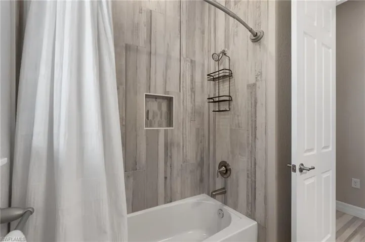 Bathroom with shower / tub combo