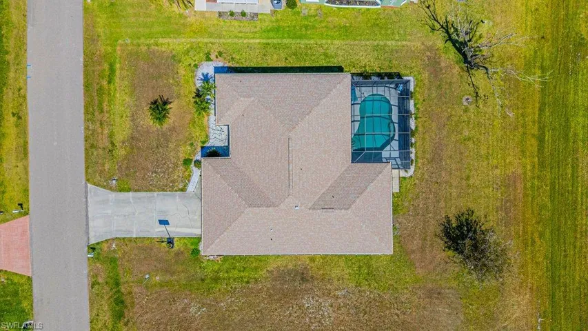 View from above of property featuring a pool