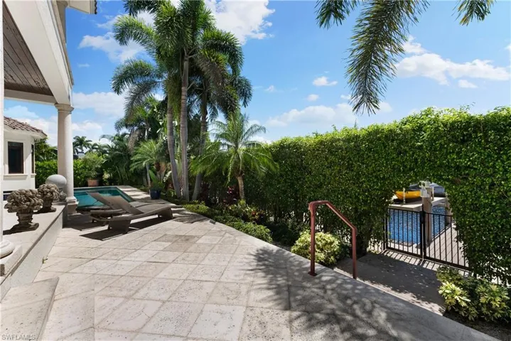 View of patio / terrace featuring a fenced in pool