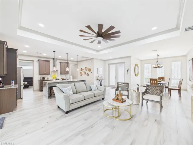 Open concept living area featuring light wood-finish flooring throughout