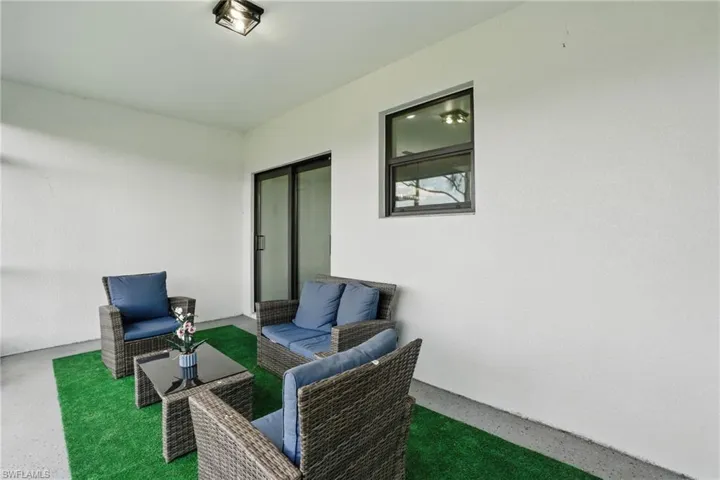 View of patio with an outdoor living space