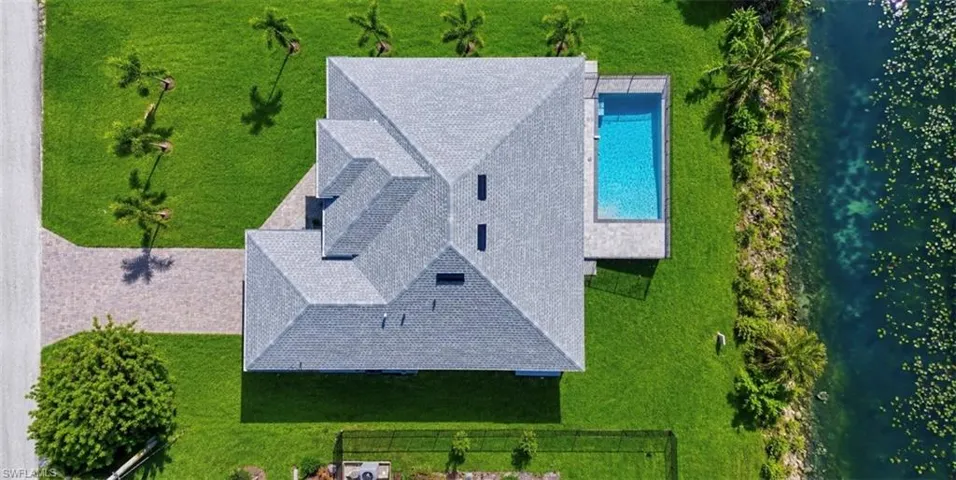 Gray shingle roof structure with multiple gables