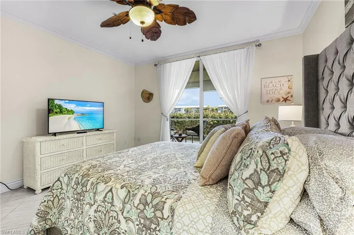 The master bedroom has a private entrance out to the expansive lanai and allows easy access to the laundry area, too.