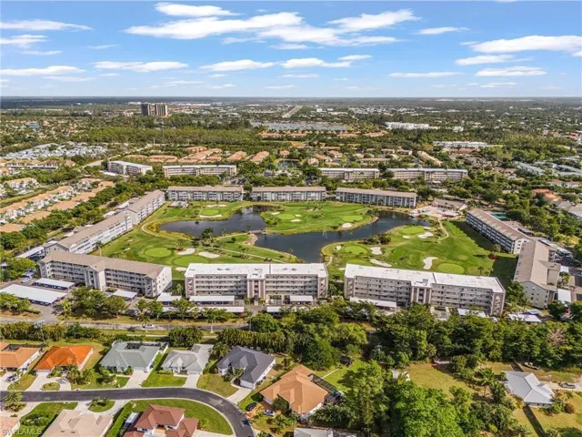 Of the 2 flat-roofed building in the foreground Sawgrass is the one on the right.