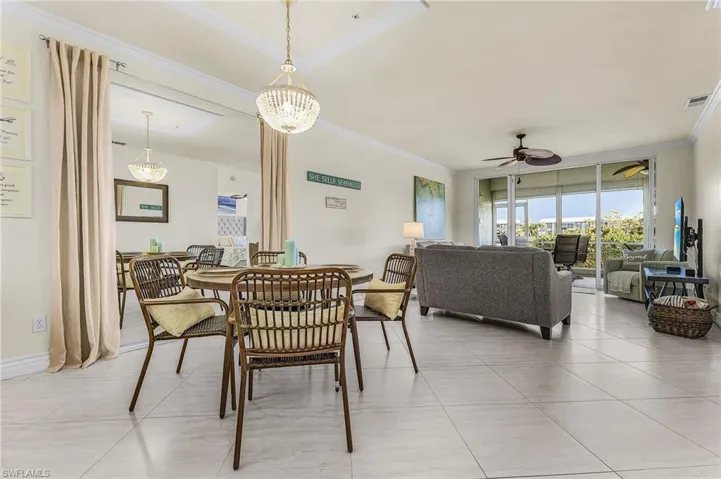 24" seamless diagonal tile, custom mirrors, designer light fixtures, crown moulding enhance the dining & living areas.
