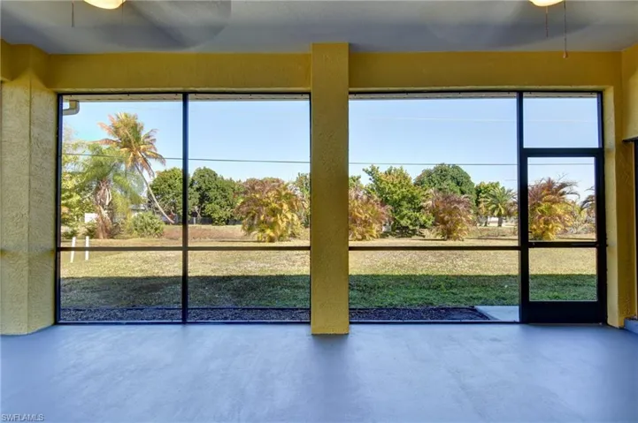 Unfurnished sunroom featuring healthy amount of natural light