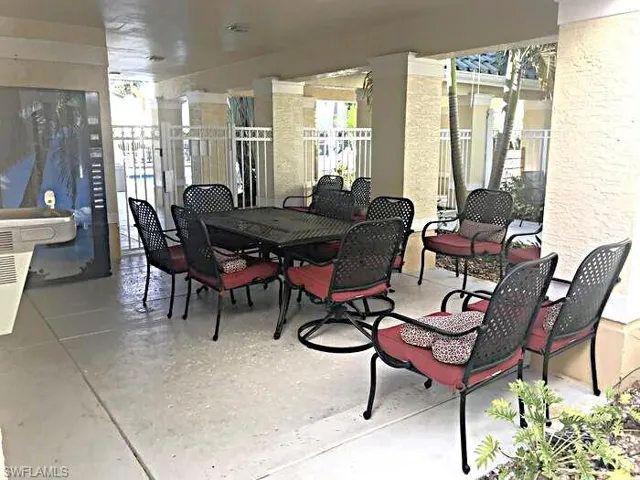 View of patio with outdoor dining area
