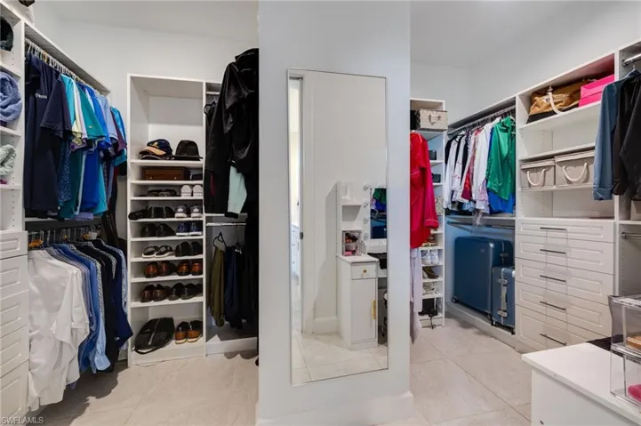 Huge primary custom-built closet