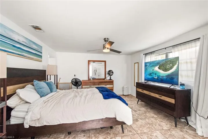 Bedroom featuring a ceiling fan