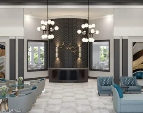 Reception featuring a chandelier