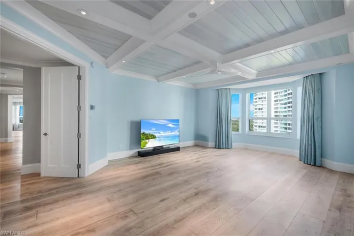 Primary Bedroom with detail coffered ceiling