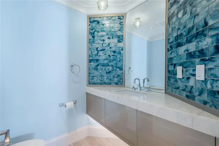 Powder room - under-lit vanity
