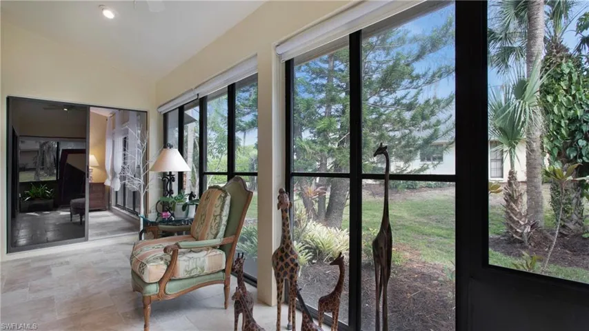 Sunroom with lofted ceiling