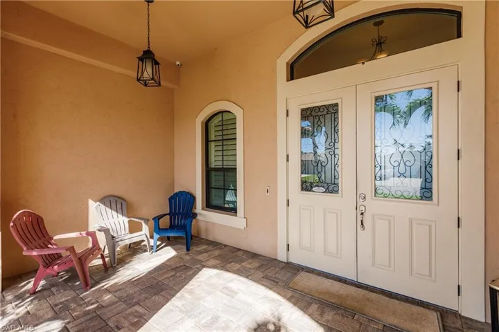 Property entrance with french doors