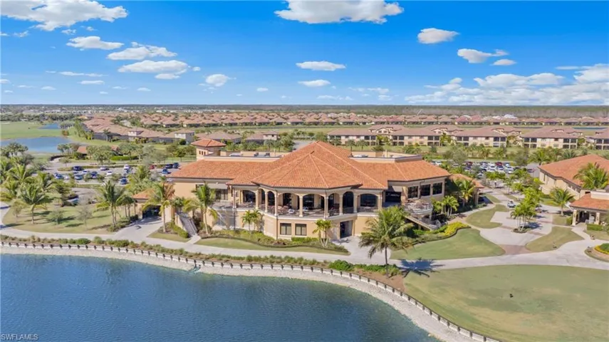 Aerial view with a water view and a residential view