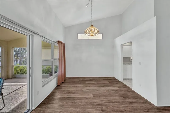 Access the kitchen to the right of the dining area.