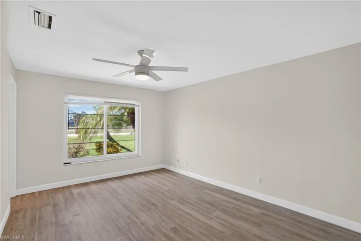 Master Bedroom featuring light wood-type flooring and Walk In closet