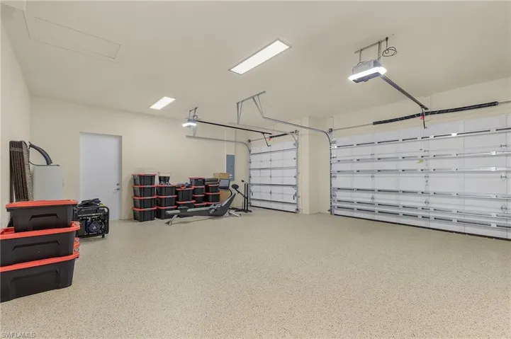 Three car garage with decorative flake epoxy floors
