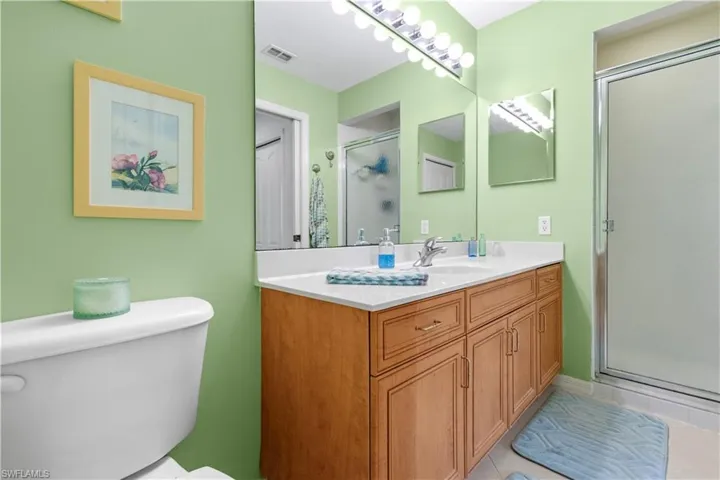 Primary bathroom featuring a walk-in shower