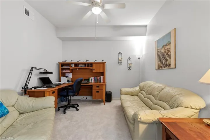 Versatile den featuring brand new carpeting
