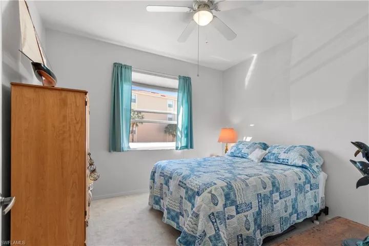 Guest bedroom featuring brand new carpet