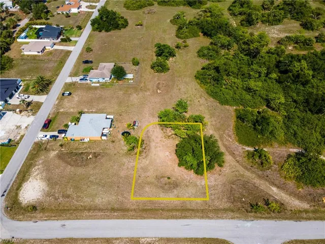 Aerial overview of property's location featuring property parcel outlined
