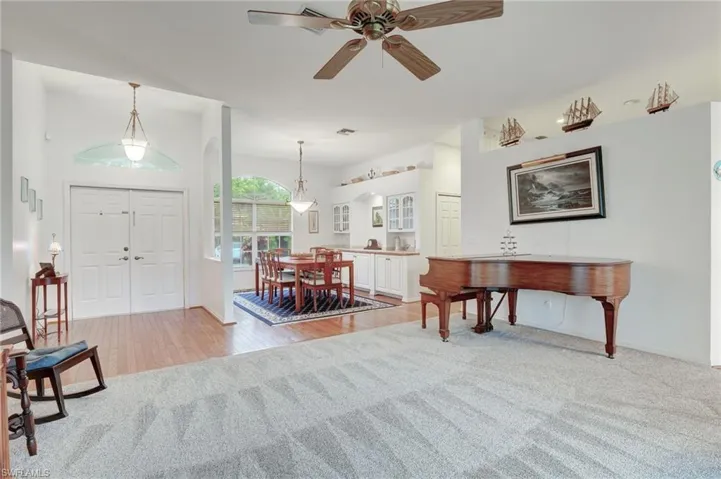 Newly Carpeted entrance foyer , formal dining & formal living