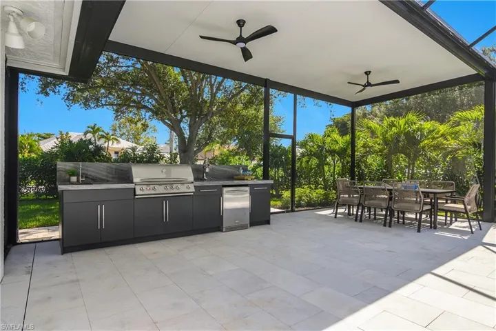 Outdoor kitchen & covered dining area