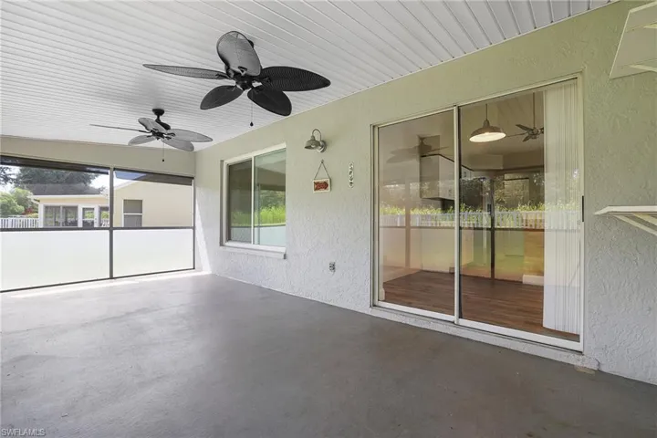 View of patio with ceiling fan