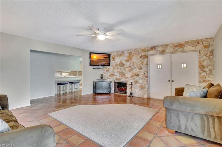 With wood-burning fireplace and TV included